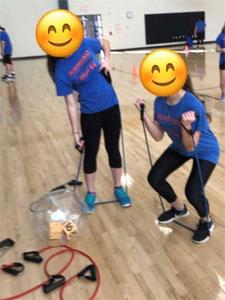 Children using exercise equipment at Northeast Junior High